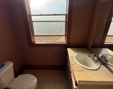1165 E 10th Street - Photo Thumbnail 9