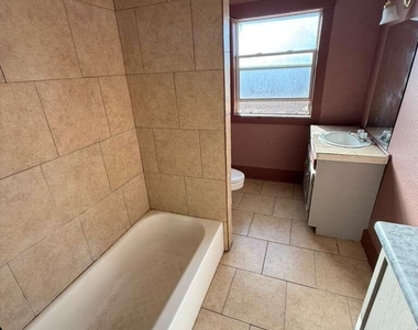 1165 E 10th Street - Photo Thumbnail 7