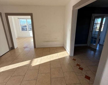1165 E 10th Street - Photo Thumbnail 2