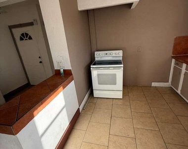 1165 E 10th Street - Photo Thumbnail 6