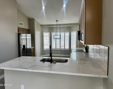 7570 W Jenan Drive - Photo Thumbnail 9
