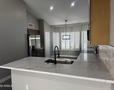 7570 W Jenan Drive - Photo Thumbnail 2