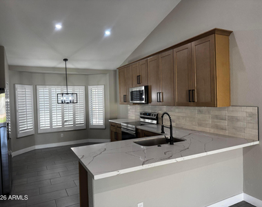 7570 W Jenan Drive - Photo Thumbnail 3