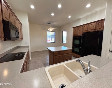 14313 W Alvarado Drive - Photo Thumbnail 7