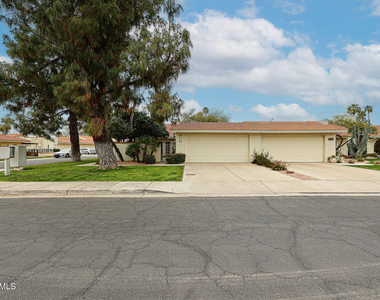 7720 N Pinesview Drive - Photo Thumbnail 1