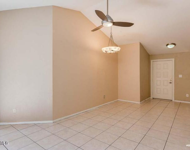 1402 S Jentilly Lane - Photo Thumbnail 2