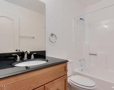 1402 S Jentilly Lane - Photo Thumbnail 9