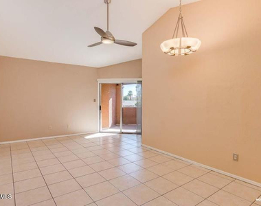 1402 S Jentilly Lane - Photo Thumbnail 3