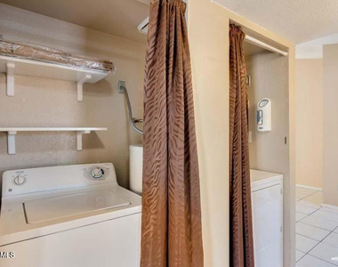 1402 S Jentilly Lane - Photo Thumbnail 12