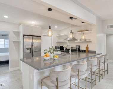 7504 E 1st Street - Photo Thumbnail 7