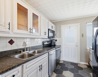 4700 Washington Street - Photo Thumbnail 5