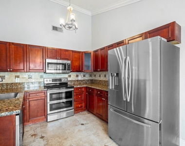 8411 Garden Gate Place - Photo Thumbnail 2
