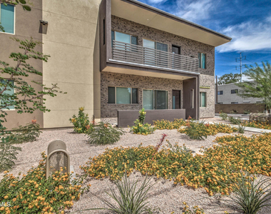 1037 S Farmer Avenue - Photo Thumbnail 1