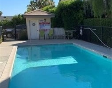 9315 Burnet Avenue - Photo Thumbnail 18