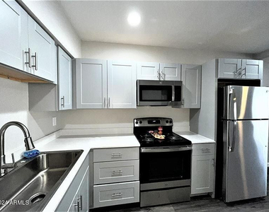 1130 E Grovers Avenue - Photo Thumbnail 2