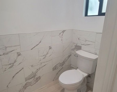 1427 S Shenandoah Street - Photo Thumbnail 2
