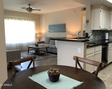 9450 E Becker Lane - Photo Thumbnail 6