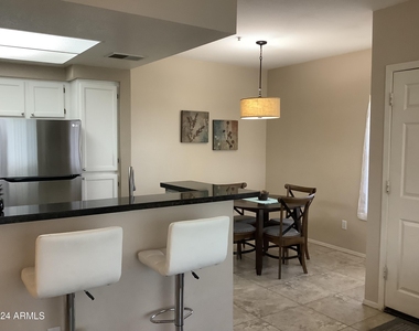 9450 E Becker Lane - Photo Thumbnail 5