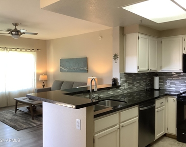 9450 E Becker Lane - Photo Thumbnail 7