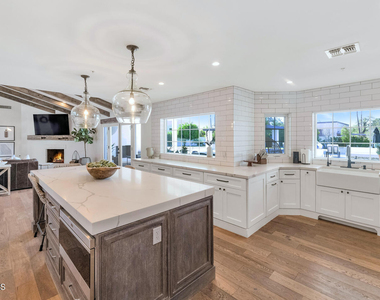 8313 E Carol Way - Photo Thumbnail 8