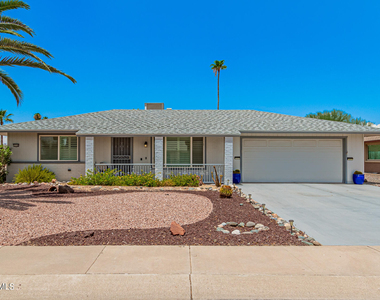 10146 W Sombrero Circle - Photo Thumbnail 1