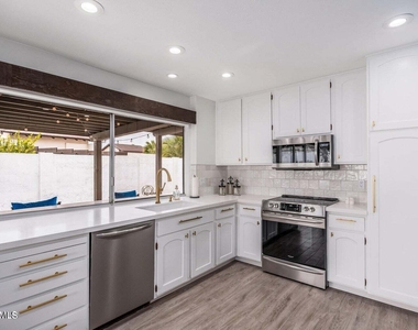7733 E Hubbell Street - Photo Thumbnail 4