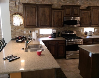 12968 W Yellow Bird Lane - Photo Thumbnail 5