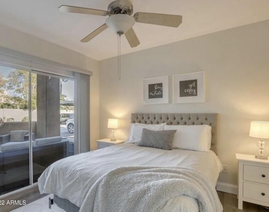 9450 E Becker Lane - Photo Thumbnail 9
