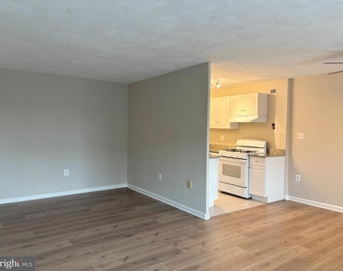 1200 S Arlington Ridge Road S - Photo Thumbnail 4