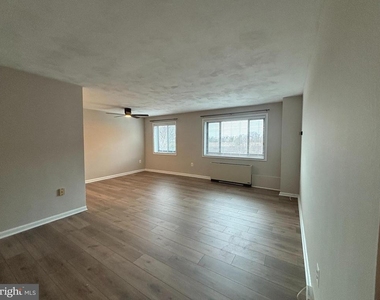 1200 S Arlington Ridge Road S - Photo Thumbnail 1