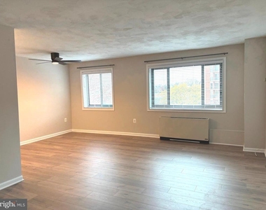 1200 S Arlington Ridge Road S - Photo Thumbnail 2