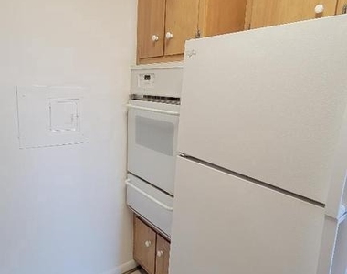 10401 Grosvenor Place - Photo Thumbnail 8