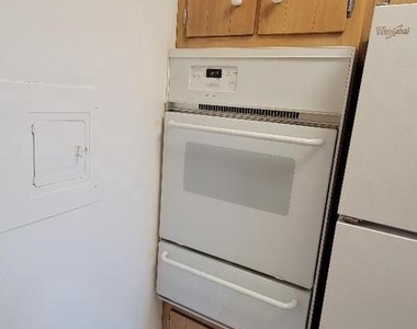 10401 Grosvenor Place - Photo Thumbnail 7