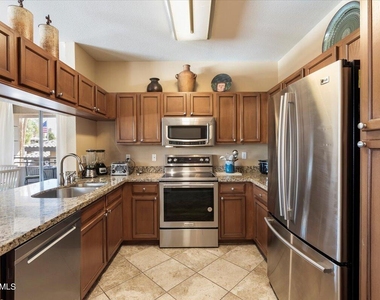 7009 E Acoma Drive - Photo Thumbnail 4