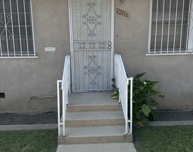1021 1/2 W 90th Street - Photo Thumbnail 1