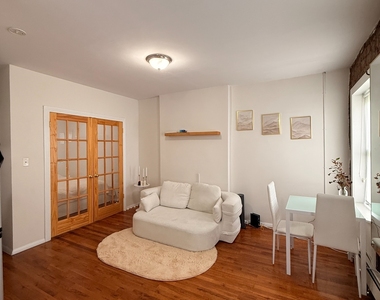 173 East 117th Street - Photo Thumbnail 1