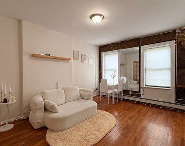 173 East 117th Street - Photo Thumbnail 2