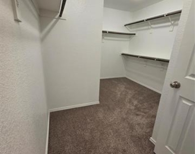 7504 Boat Wind Road - Photo Thumbnail 11