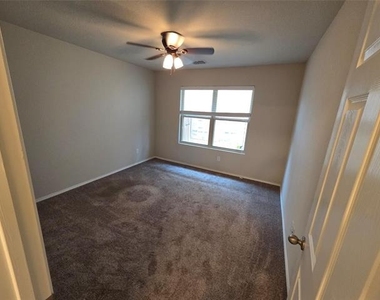 7504 Boat Wind Road - Photo Thumbnail 15