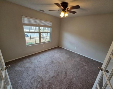 7504 Boat Wind Road - Photo Thumbnail 2