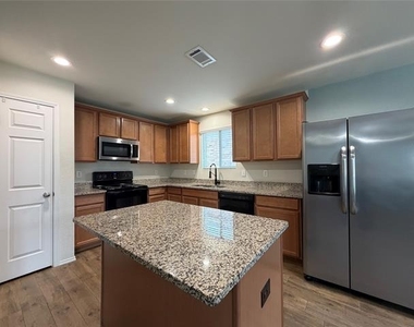 9913 Amosite Drive - Photo Thumbnail 9