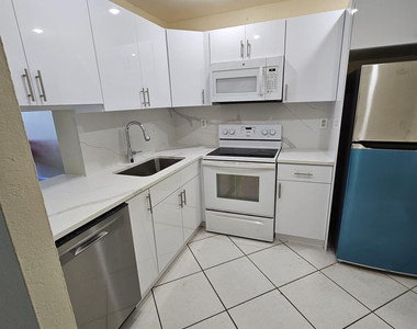 5665 W 20th Avenue - Photo Thumbnail 1