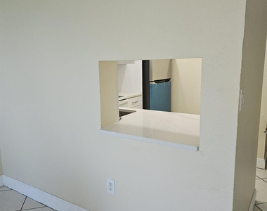 5665 W 20th Avenue - Photo Thumbnail 5