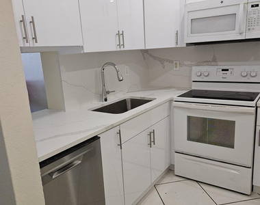 5665 W 20th Avenue - Photo Thumbnail 2