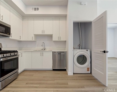 14810 Delano Street - Photo Thumbnail 2