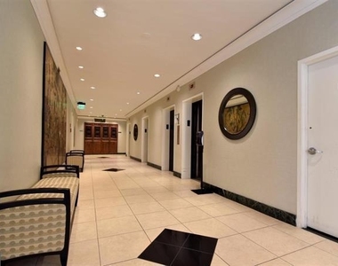 10401 Grosvenor Place - Photo Thumbnail 3