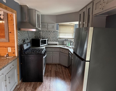 6811 Saint Augustine Street - Photo Thumbnail 3