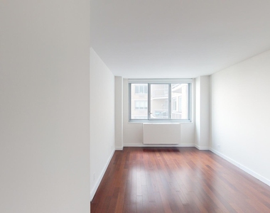 401 E 34th St - Photo Thumbnail 3