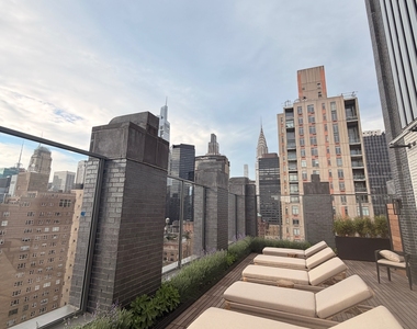 162 East 36th Street - Photo Thumbnail 4