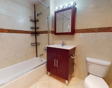 84-14 143rd Street - Photo Thumbnail 14